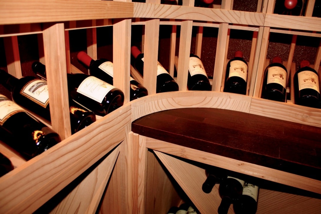 Redwood Custom Wine Cellar Racks with a Reclaimed Barrel Tabletop Los Angeles