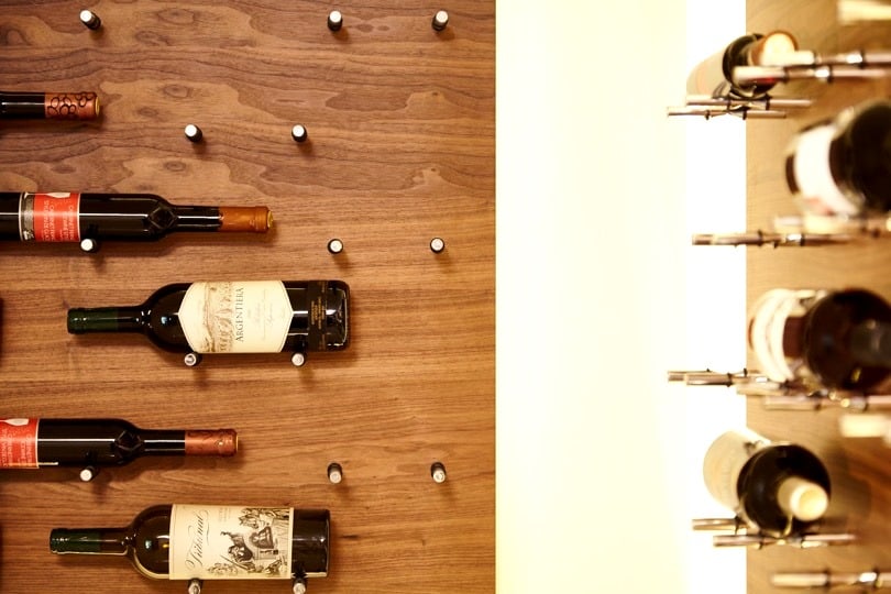 Label-Forward Contemporary Peg Wine Racks Designed by Los Angeles Master Builders