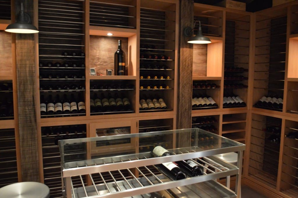 Los Angeles Home Wine Cellar with Efficient Cooling Unit and Stylish Custom Wine Racks