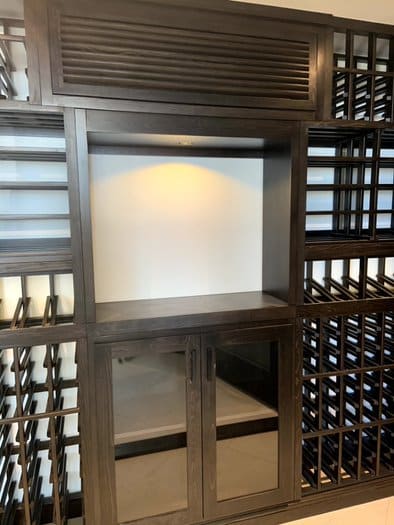 We Hid the Cooling Unit Evaporator At the Top Section of the Custom Wine Racks on the Back Wall Glass Wine cellar Project Los Angeles