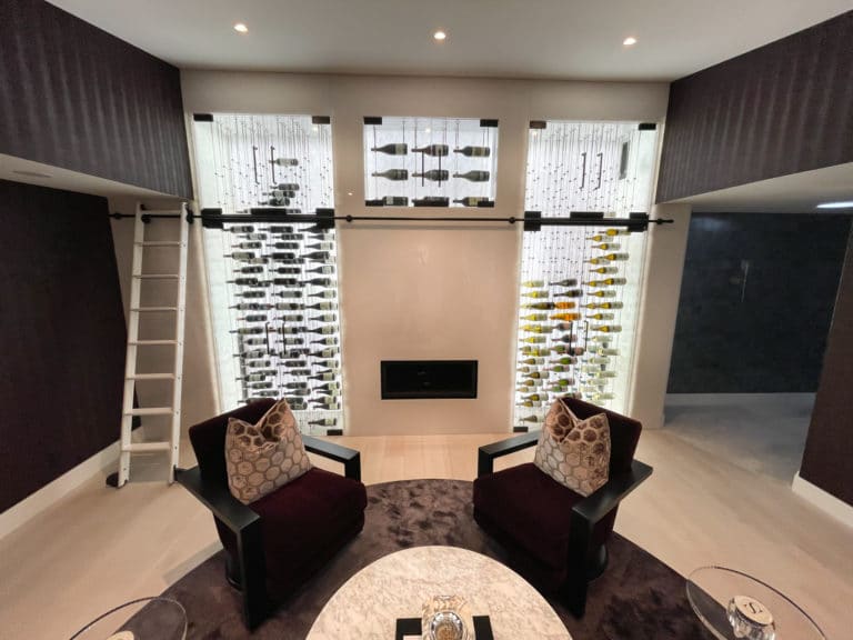 Rolling Ladder Incorporated into the Modern Home Wine Cellar Design