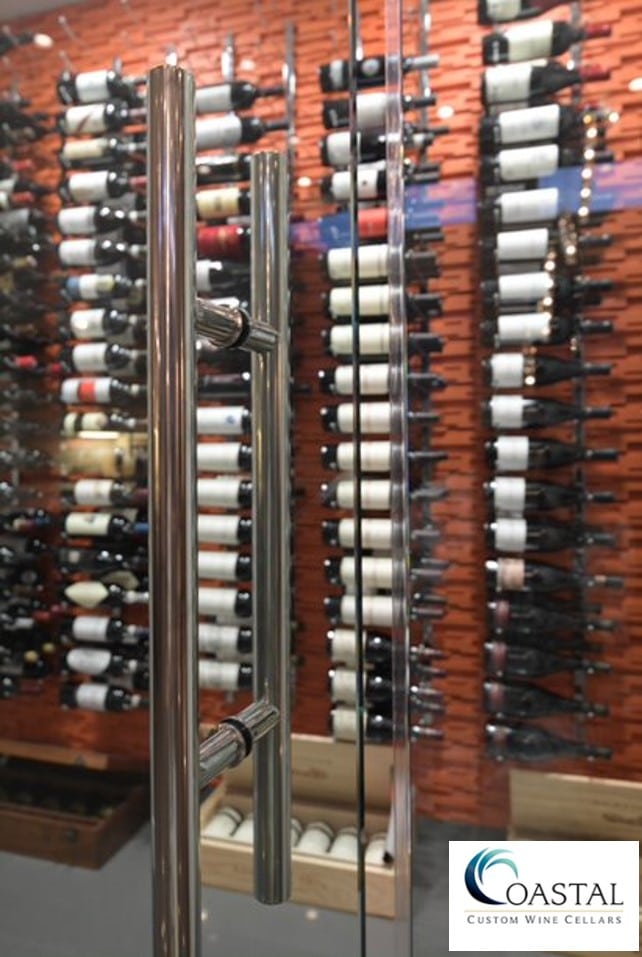 Los Angeles Glass Wine Cellar Designed with Elegant Metal Wine Racks and 