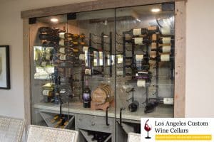wine cellar glass doors and wooden wine racking system