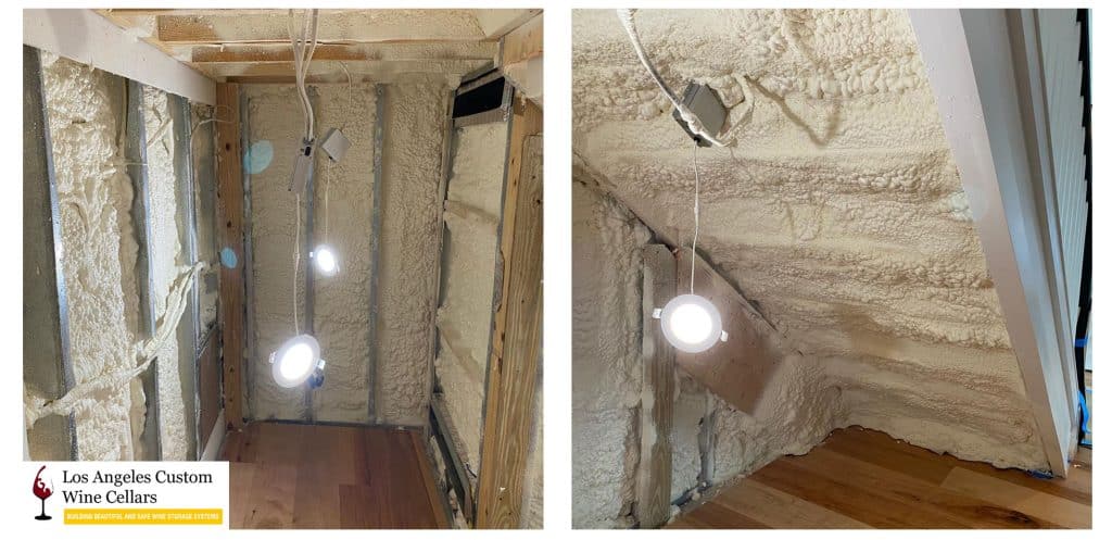 The photo shows the application of spray foam insulation on the wine cellar walls.