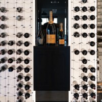 This incredible modern wine cellar is a wonderful home for Cable Wine Displays racking.