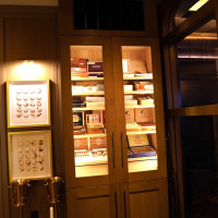 (9) For the cabinets and humidor, they implemented a combination of low-heat LED lights and channel lighting.