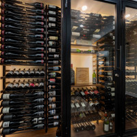 (2) A contemporary wine closet idea that never fails is balancing metal, glass and wood to create a great display.