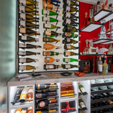 (11) This wine cellar for homes' layout balances efficiency with elegance.